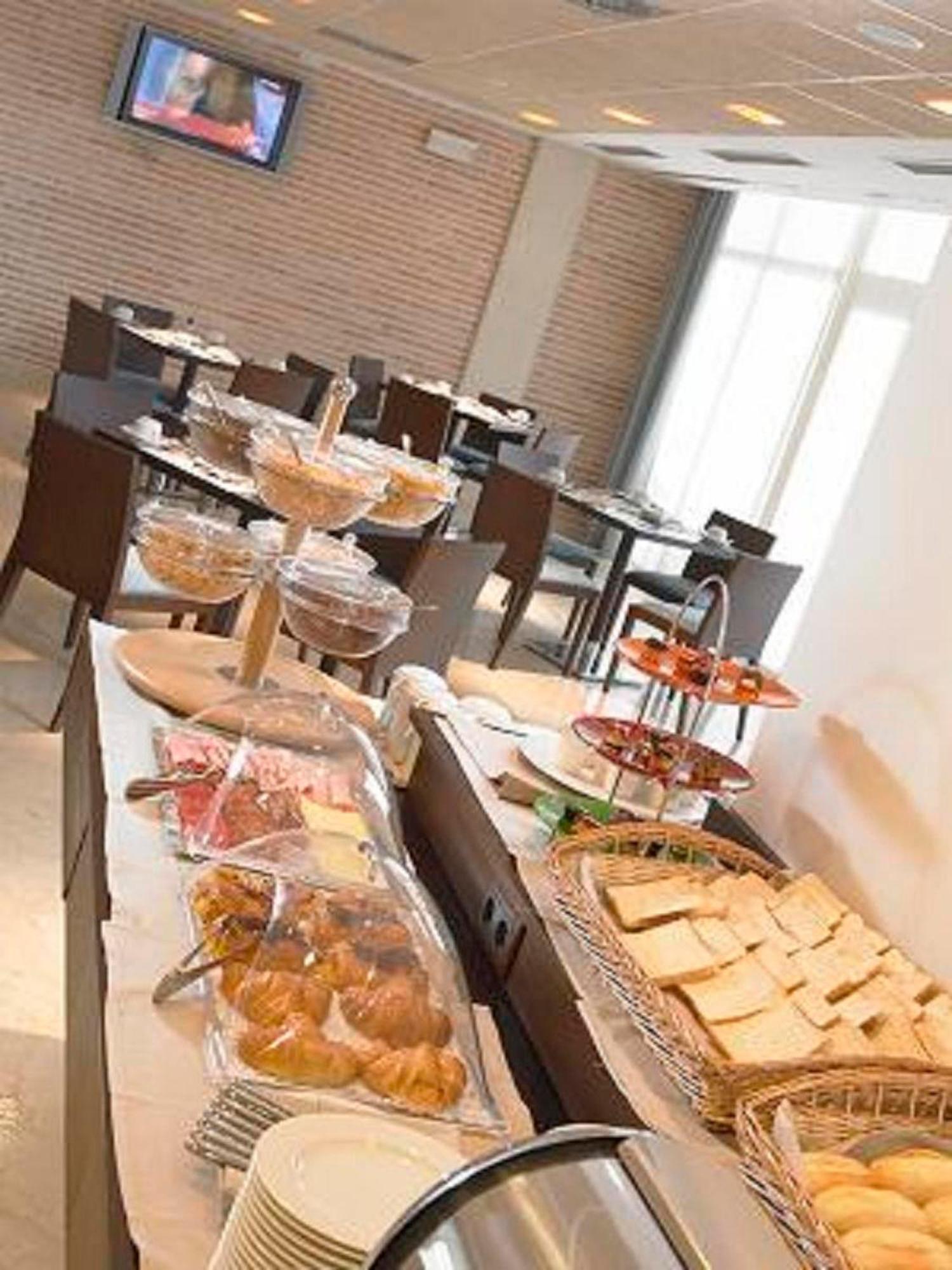Hotel Isla De La Garena Alcalá de Henares Restauracja zdjęcie